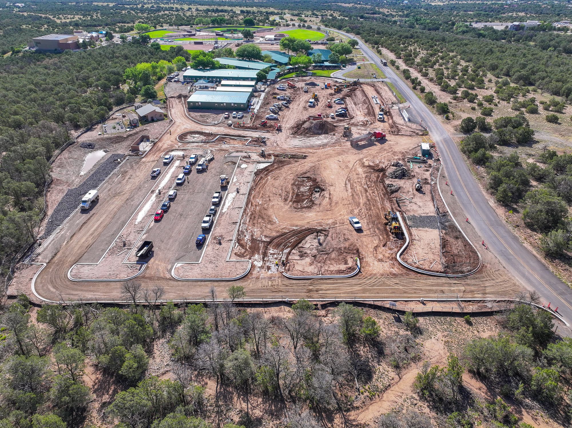 Aerial of the East Mountain High School site cut into the juniper hills